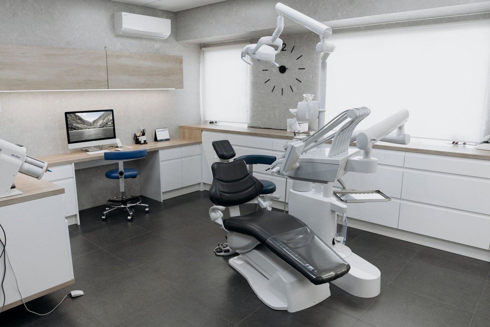 Modern dental treatment room with a dental chair