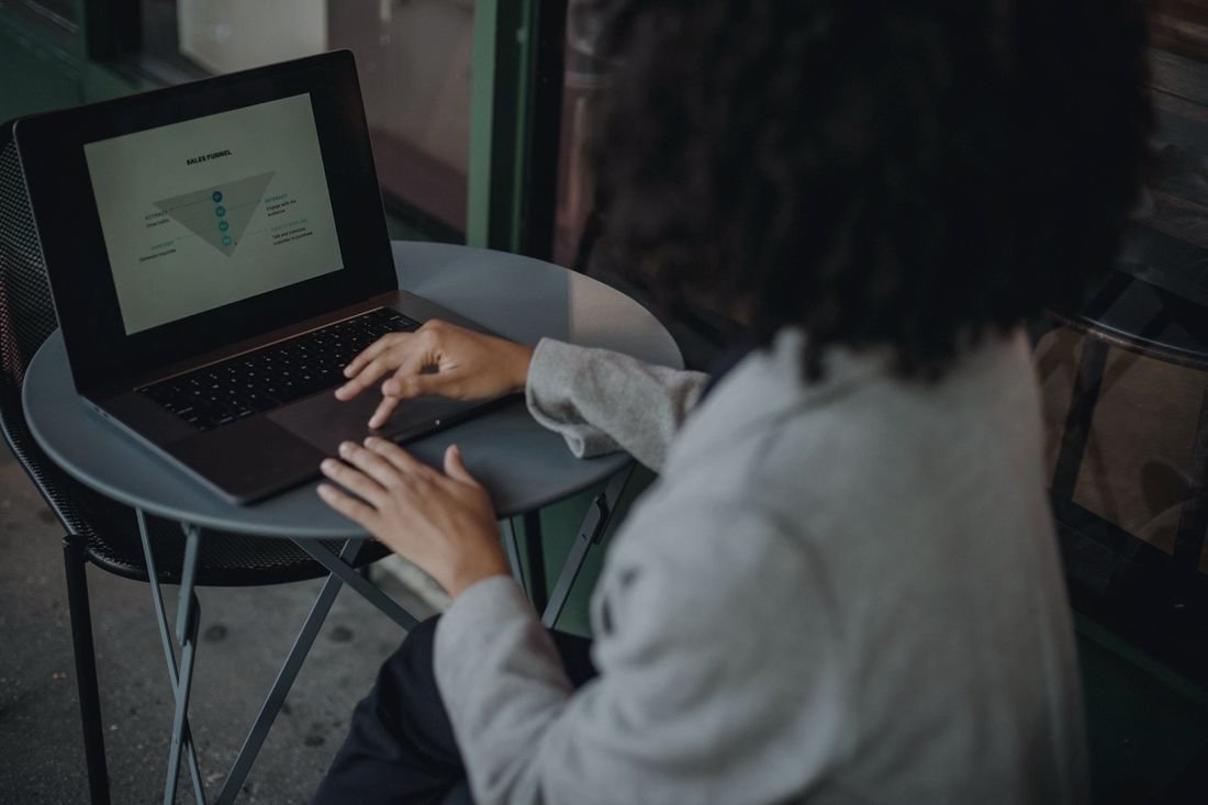 Person working on a laptop at home